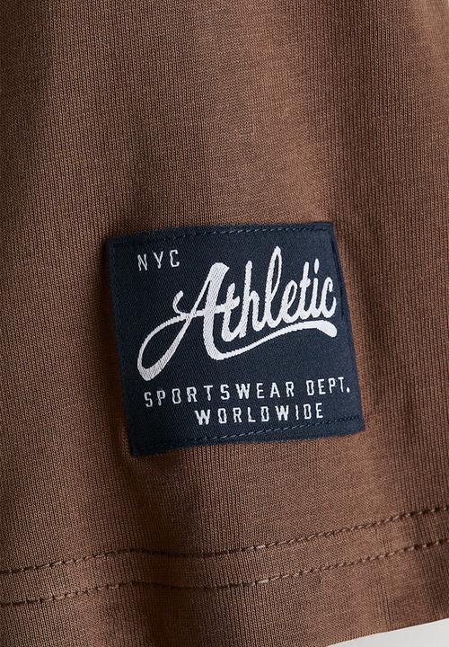 H&M - Loose-fit printed t-shirt - brown/new york