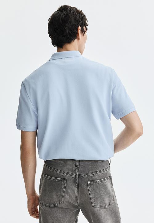 H&M - Regular fit polo shirt - light blue