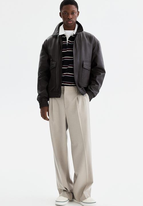 H&M - Loose fit rugby shirt - black/striped