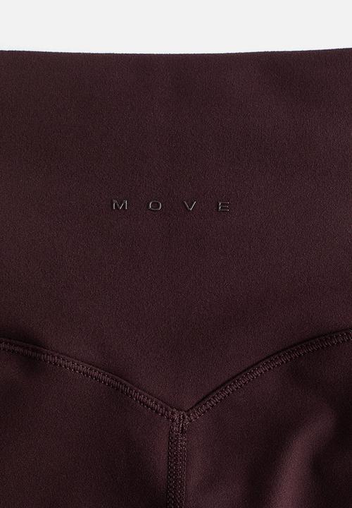 H&M - Flared yoga leggings with softmove™ - chocolate plum