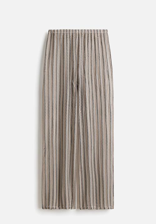 H&M - Wide hole-knit trousers - light beige/black striped