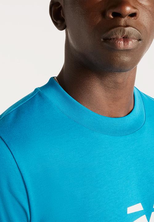 New Balance  - NB Sport Logo Tee - blue