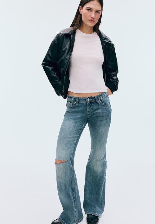H&M - Flared leg ultra low waist jeans - denim blue