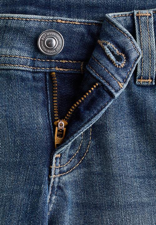 H&M - Flared leg ultra low waist jeans - denim blue