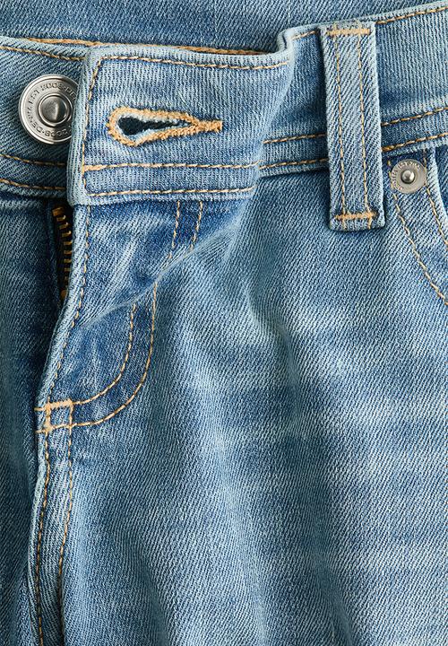 H&M - Flared leg ultra low waist jeans - light denim blue