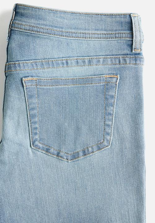 H&M - Flared leg ultra low waist jeans - light denim blue