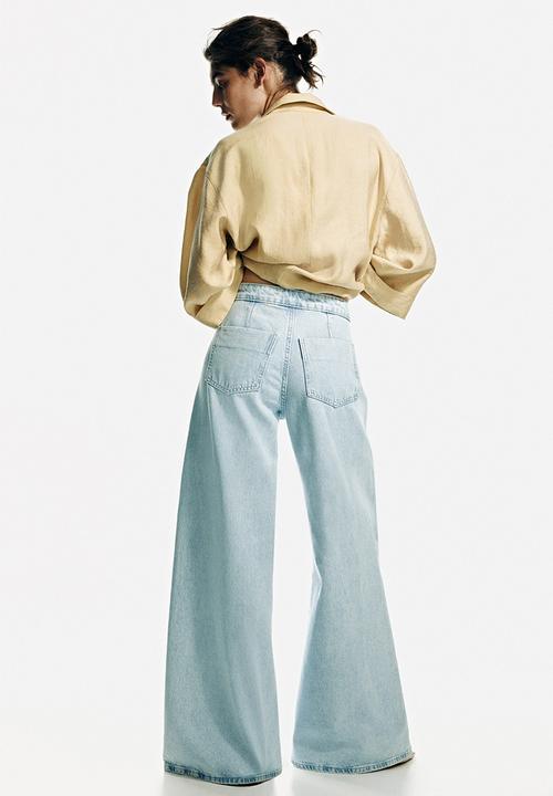 H&M - Super wide high waist jeans - light denim blue