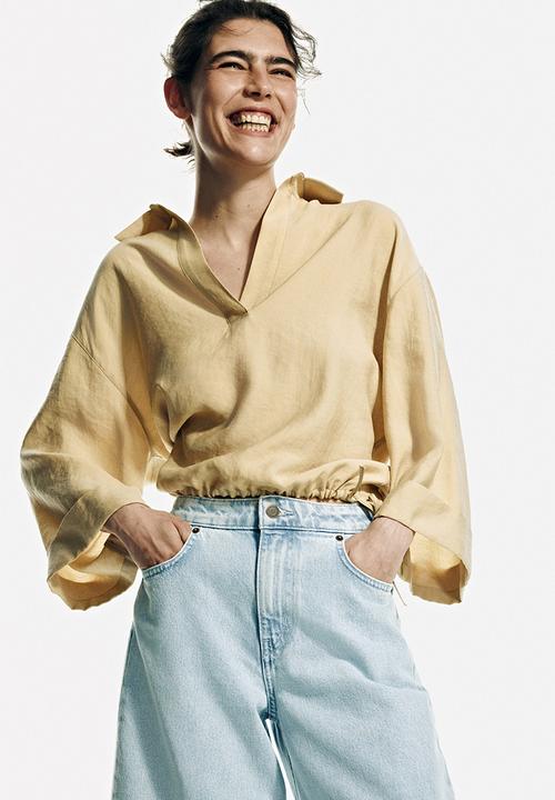 H&M - Super wide high waist jeans - light denim blue