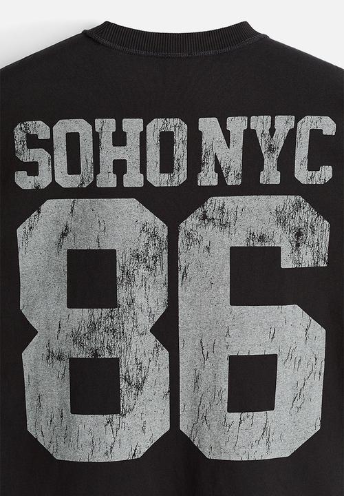 H&M - Loose fit printed T-shirt - black/soho nyc