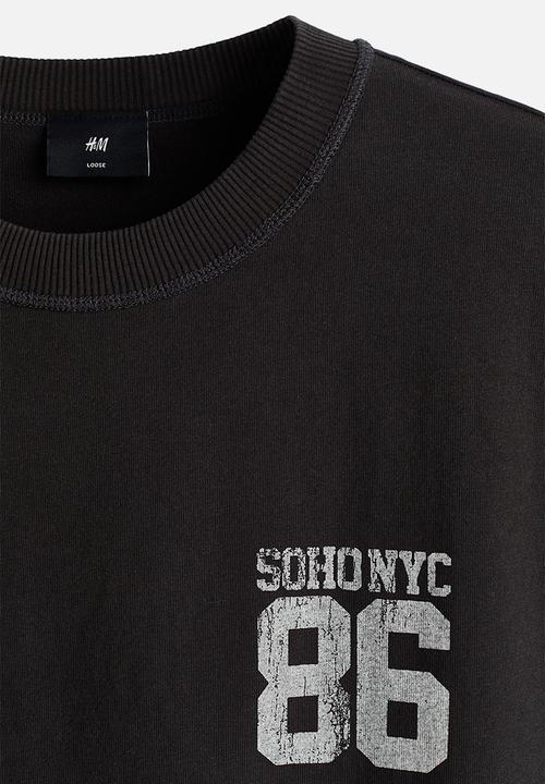 H&M - Loose fit printed T-shirt - black/soho nyc