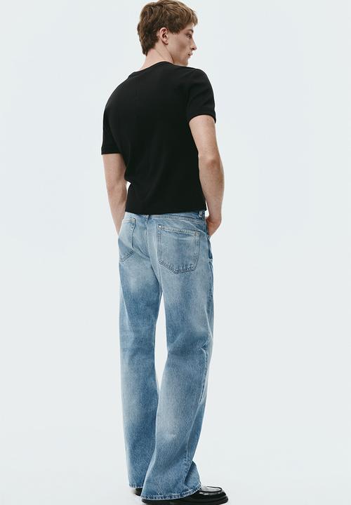 H&M - Relaxed bootcut jeans - light denim blue