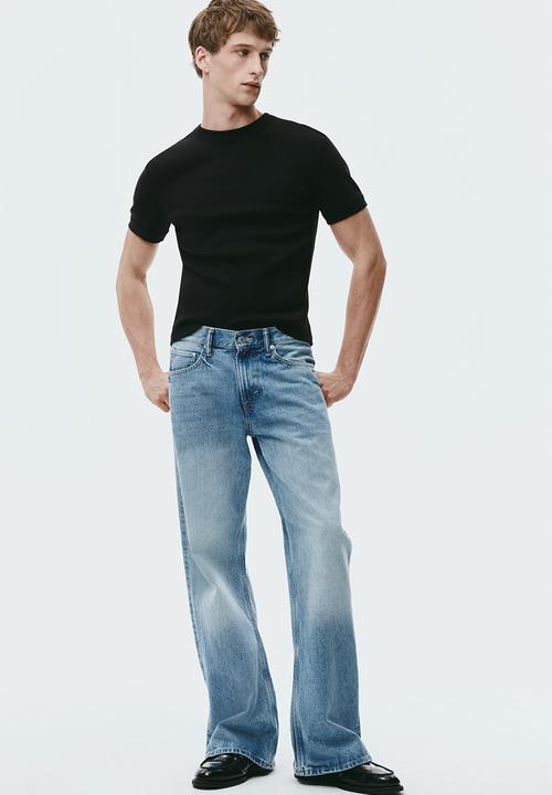 H&M - Relaxed bootcut jeans - light denim blue
