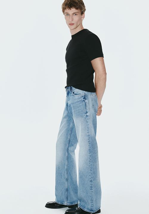 H&M - Relaxed bootcut jeans - light denim blue