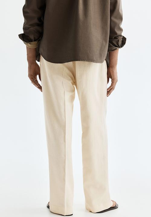 H&M - Loose fit wide linen-blend trousers - cream