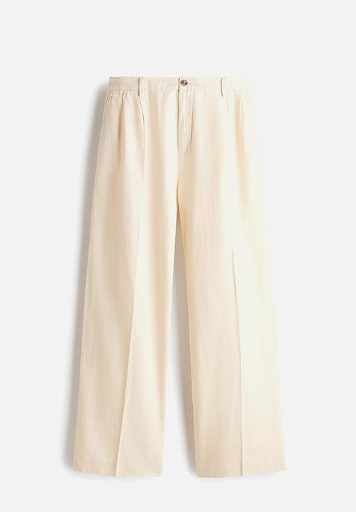 H&M - Loose fit wide linen-blend trousers - cream