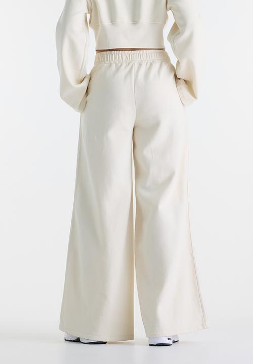 New Balance  - New Balance Brushed Coastal Fleece Pant  - Linen