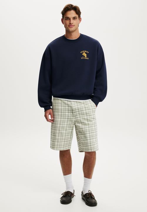 Cotton On - Relaxed Fit Graphic Crew Sweater - Vintage Navy/Fairway Fittings