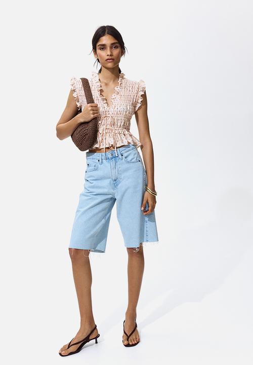 H&M - Sleeveless smocked blouse - light beige/floral