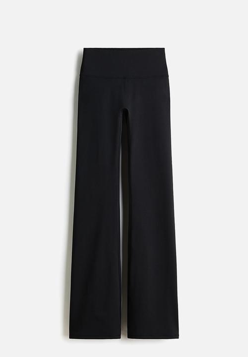 H&M - Flared yoga leggings with softmove™ - black