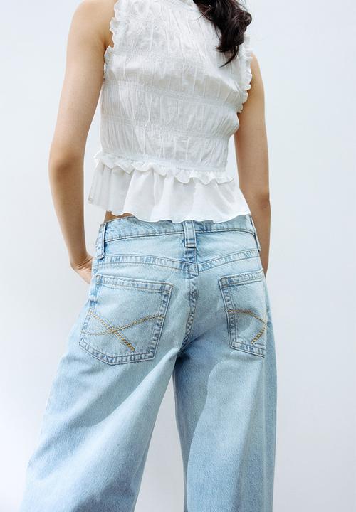 H&M - Baggy wide low waist jeans - light denim blue