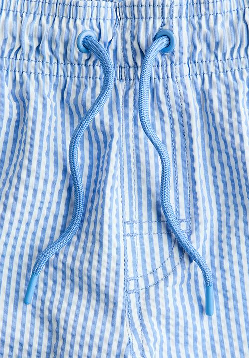 H&M - Seersucker swim shorts - light blue/striped