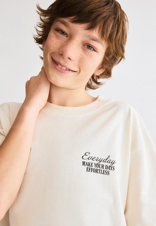 H&M - Loose-fit printed t-shirt - cream/effortless