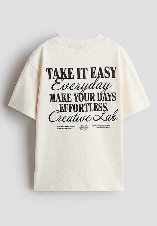 H&M - Loose-fit printed t-shirt - cream/effortless