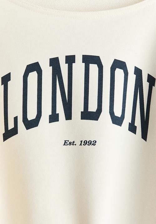 H&M - Oversized off-the-shoulder top - cream/london