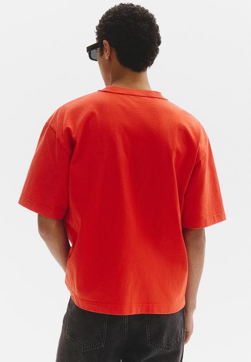 H&M - Loose fit printed t-shirt - bright orange/soho nyc