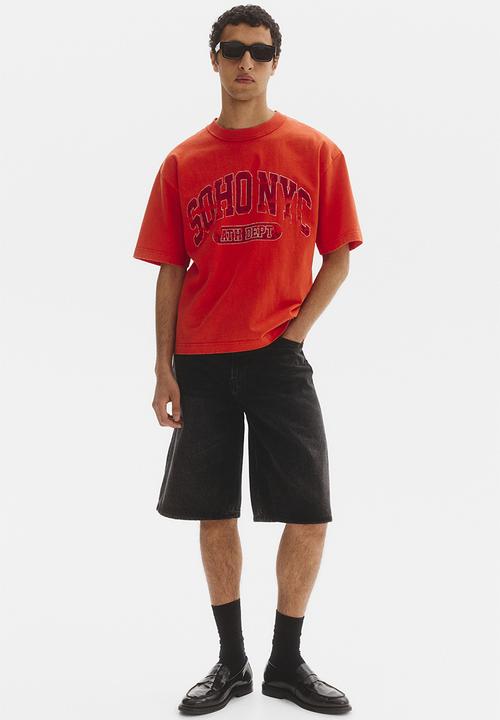 H&M - Loose fit printed t-shirt - bright orange/soho nyc