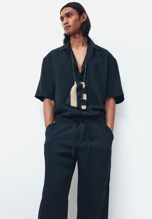 H&M - Relaxed fit textured trousers - black