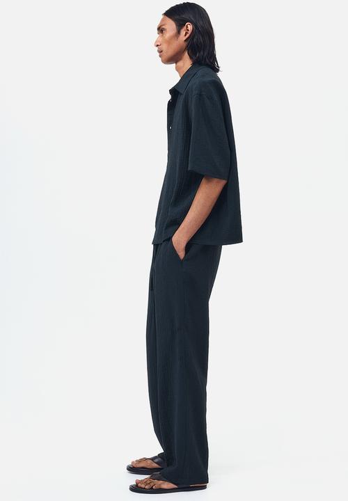 H&M - Relaxed fit textured trousers - black