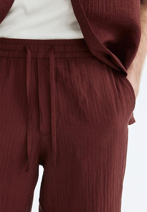 H&M - Relaxed fit textured trousers - burgundy