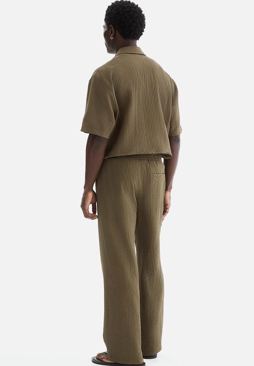 H&M - Relaxed fit textured trousers - khaki green