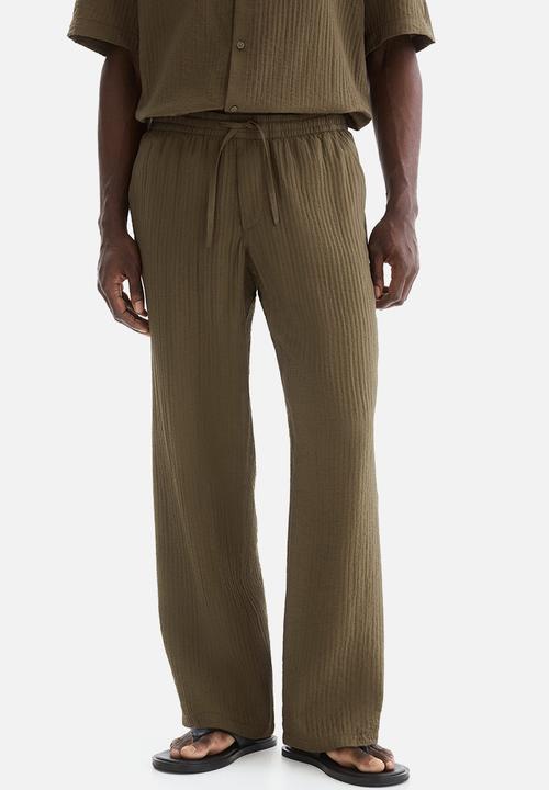 H&M - Relaxed fit textured trousers - khaki green