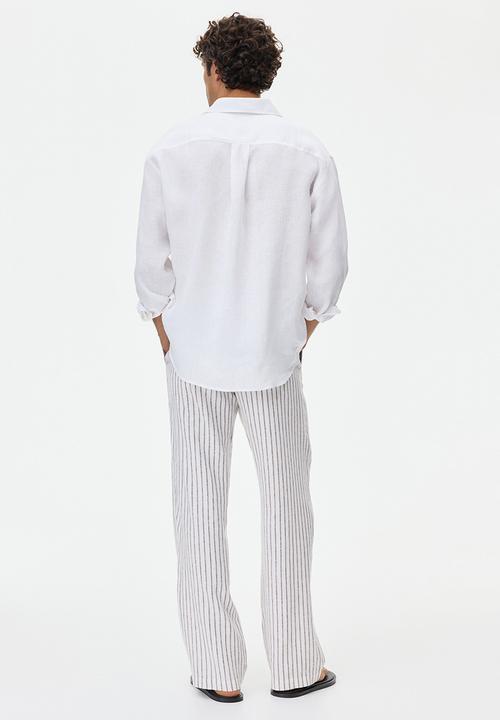 H&M - Relaxed fit linen-blend trousers - white/striped