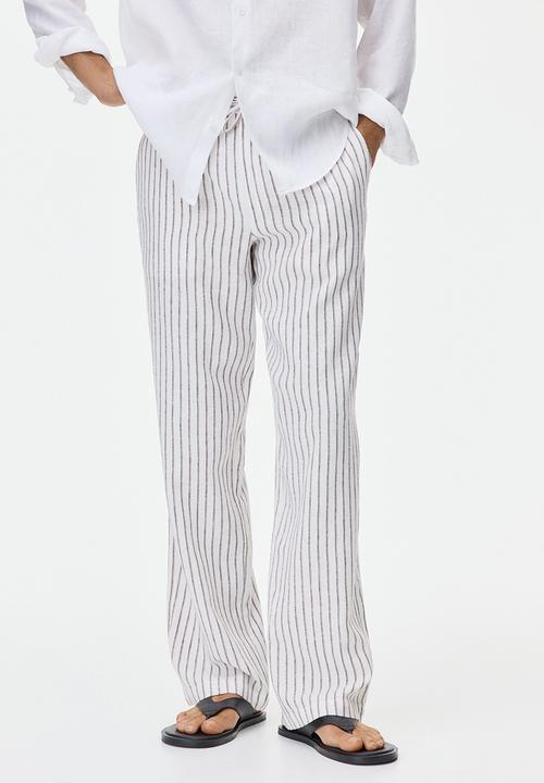 H&M - Relaxed fit linen-blend trousers - white/striped