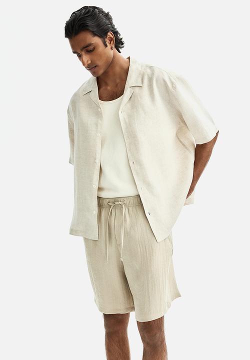 H&M - Loose fit shorts  - light beige