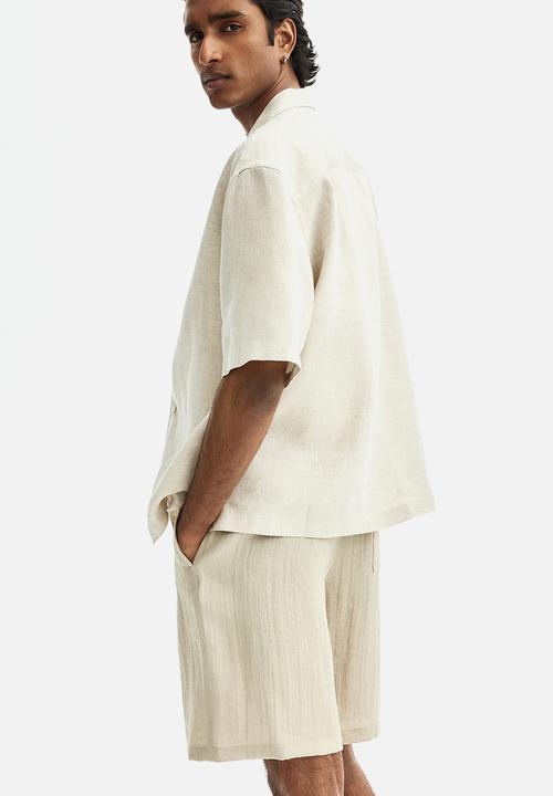 H&M - Loose fit shorts  - light beige