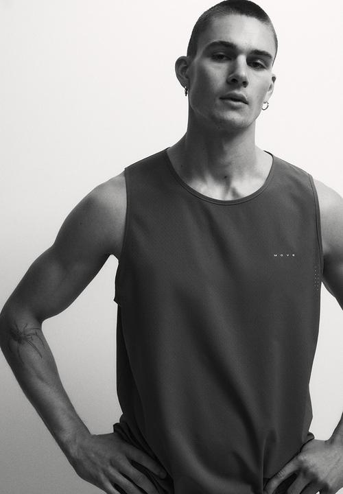 H&M - Regular fit sports vest top with drymove? - brown