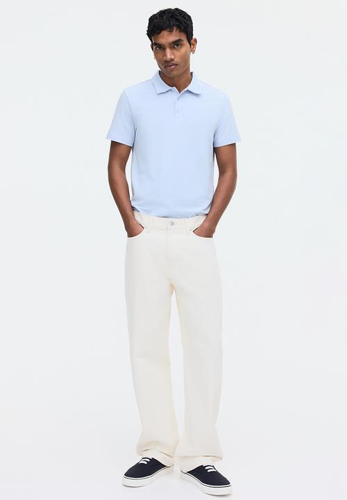 H&M - Slim fit polo shirt  - light blue