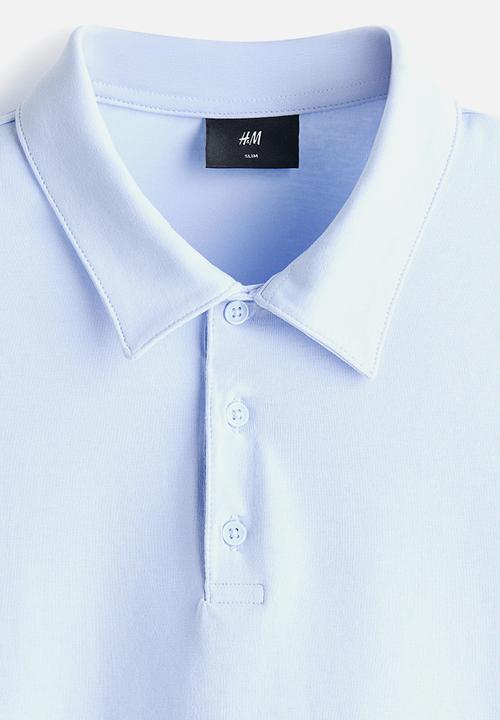 H&M - Slim fit polo shirt  - light blue