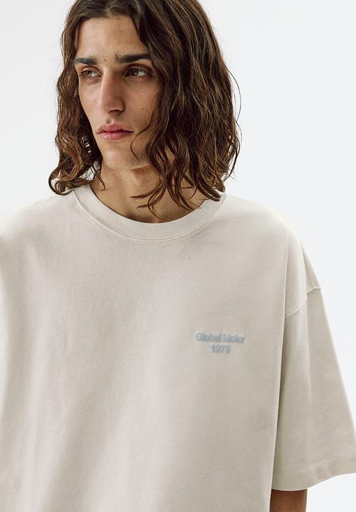 H&M - Oversized fit printed cotton t-shirt - cream/car