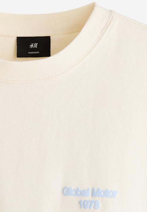 H&M - Oversized fit printed cotton t-shirt - cream/car