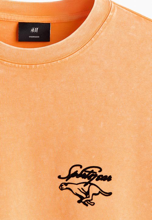 H&M - Oversized fit printed cotton t-shirt - orange/sport gear