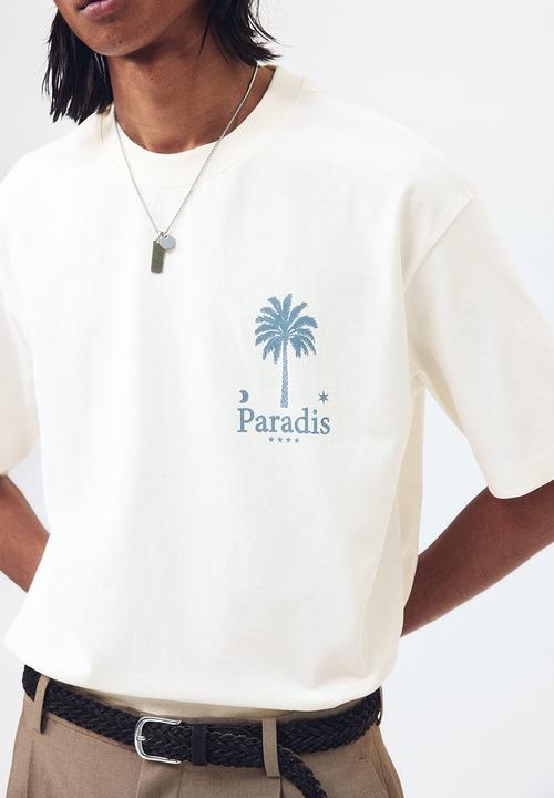 H&M - Relaxed fit printed cotton t-shirt - cream/paradis