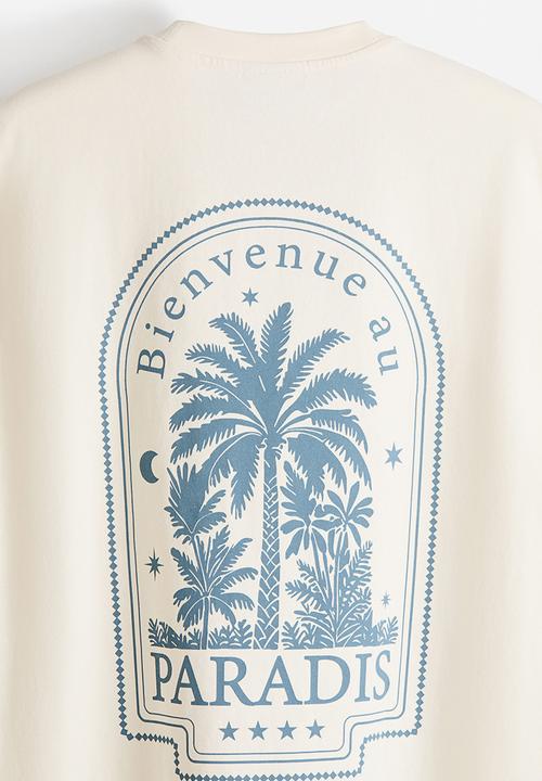 H&M - Relaxed fit printed cotton t-shirt - cream/paradis