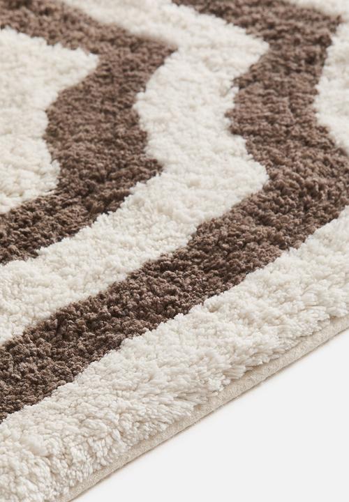 H&M - Tufted cotton bath mat - cream