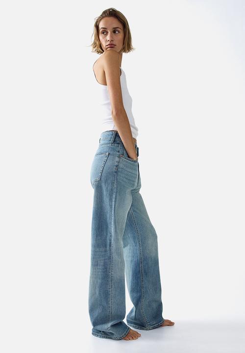 H&M - Wide high waist jeans - light denim blue