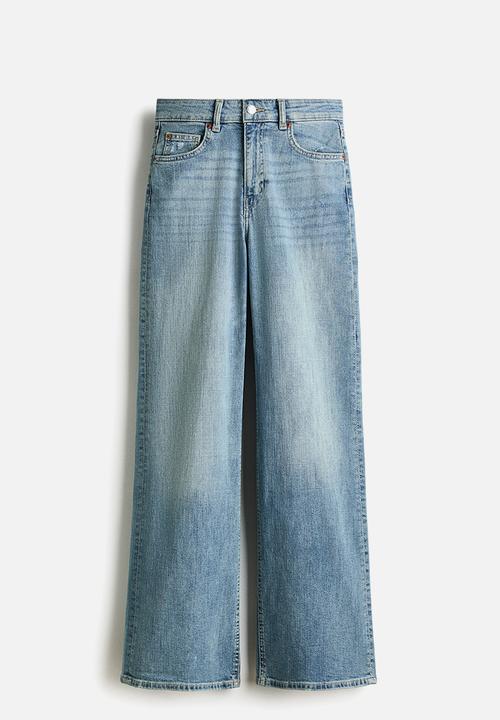 H&M - Wide high waist jeans - light denim blue